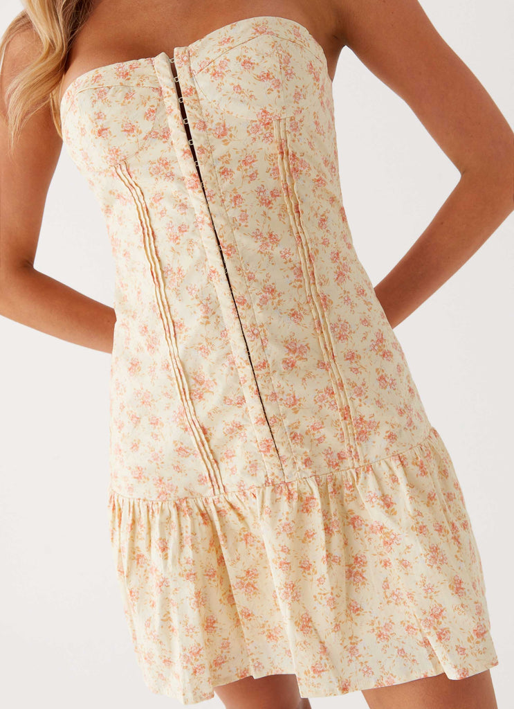 Womens Bloomsbury Bustier Mini Dress in the colour Yellow Ditsy Floral in front of a light grey background