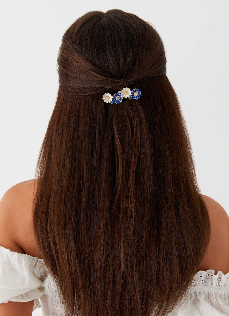 Womens Blue Skies Hair Clip in the colour Blue in front of a light grey background