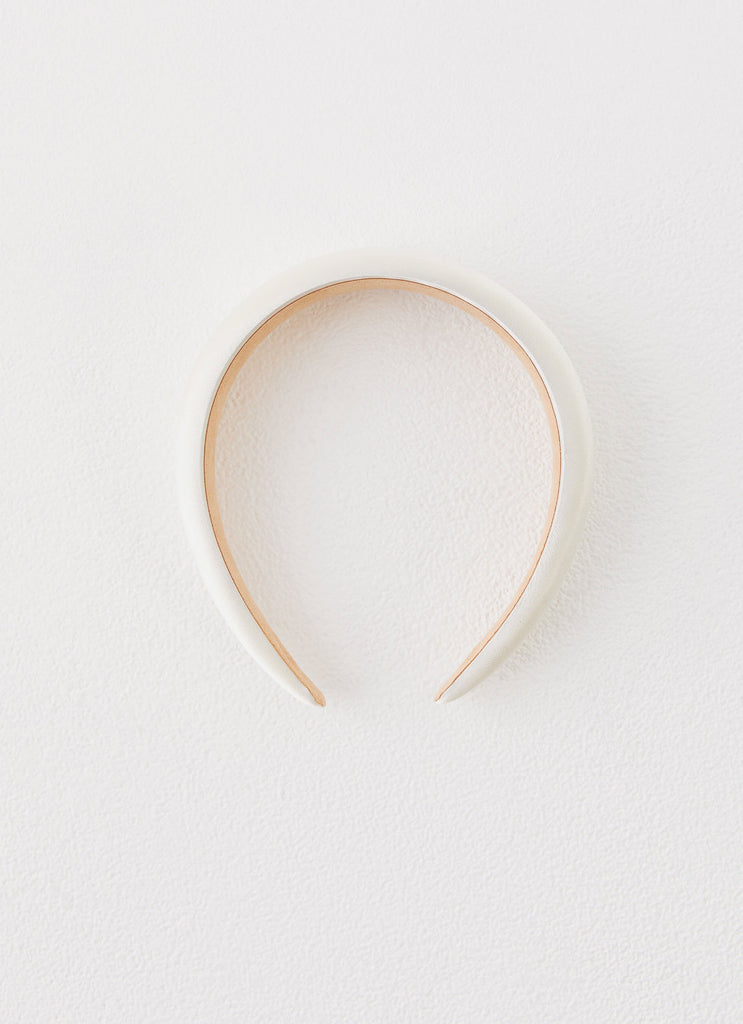 Womens Catch Me Headband in the colour Ivory in front of a light grey background