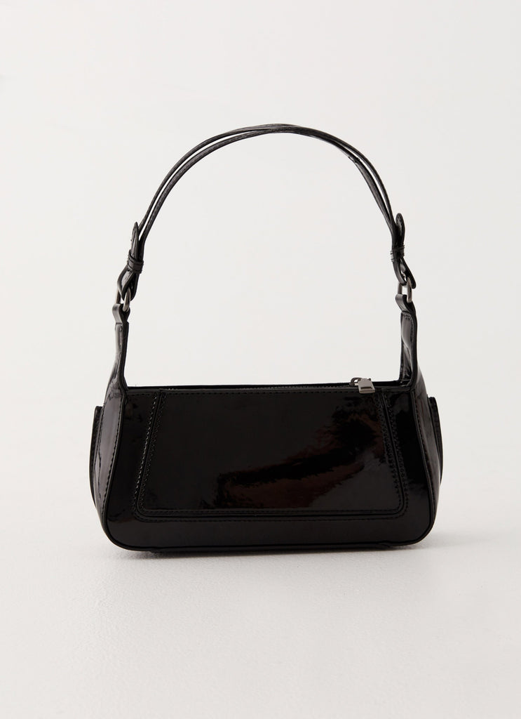 Womens Cuff It Shoulder Bag in the colour Black in front of a light grey background