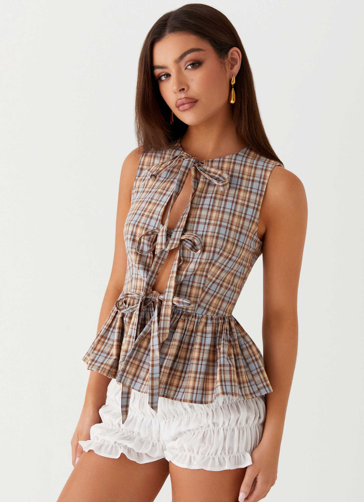 Womens Cyrene Tie Top in the colour Brown Check in front of a light grey background