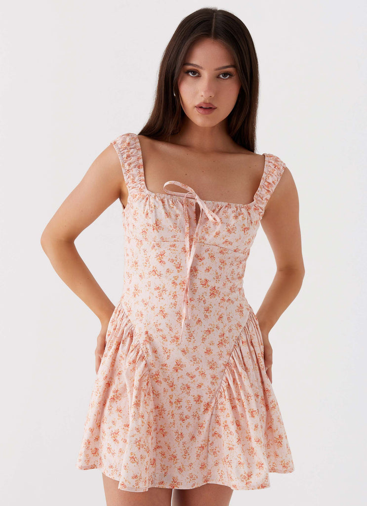 Womens Luna Ditsy Mini Dress in the colour Pink Ditsy Floral in front of a light grey background