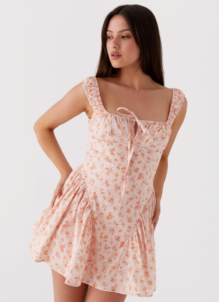 Womens Luna Ditsy Mini Dress in the colour Pink Ditsy Floral in front of a light grey background