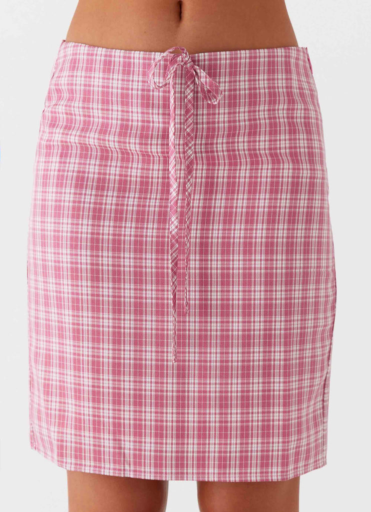 Womens Mamita Midi Skirt in the colour Pink Check in front of a light grey background