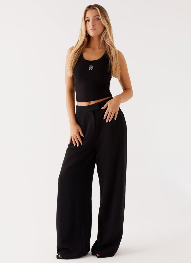 Womens Midnight City Suit Pants in the colour Black in front of a light grey background