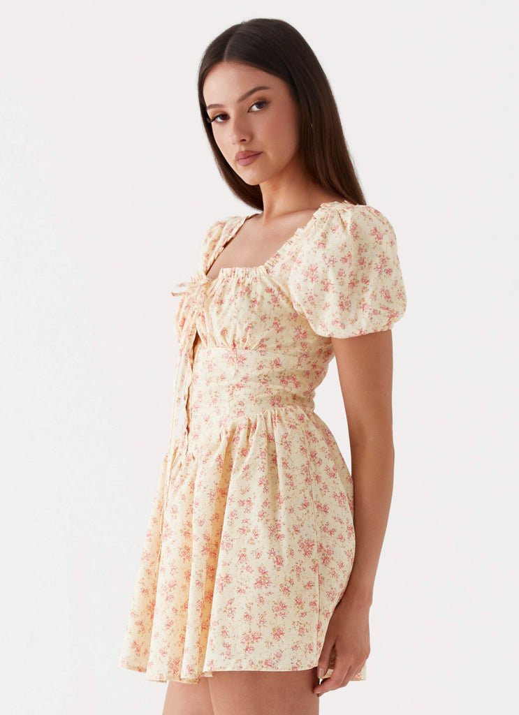 Womens Mila Mini Dress in the colour Yellow Ditsy Floral in front of a light grey background