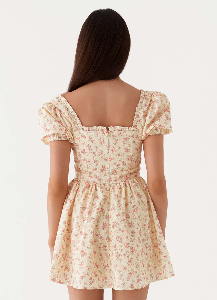 Womens Mila Mini Dress in the colour Yellow Ditsy Floral in front of a light grey background