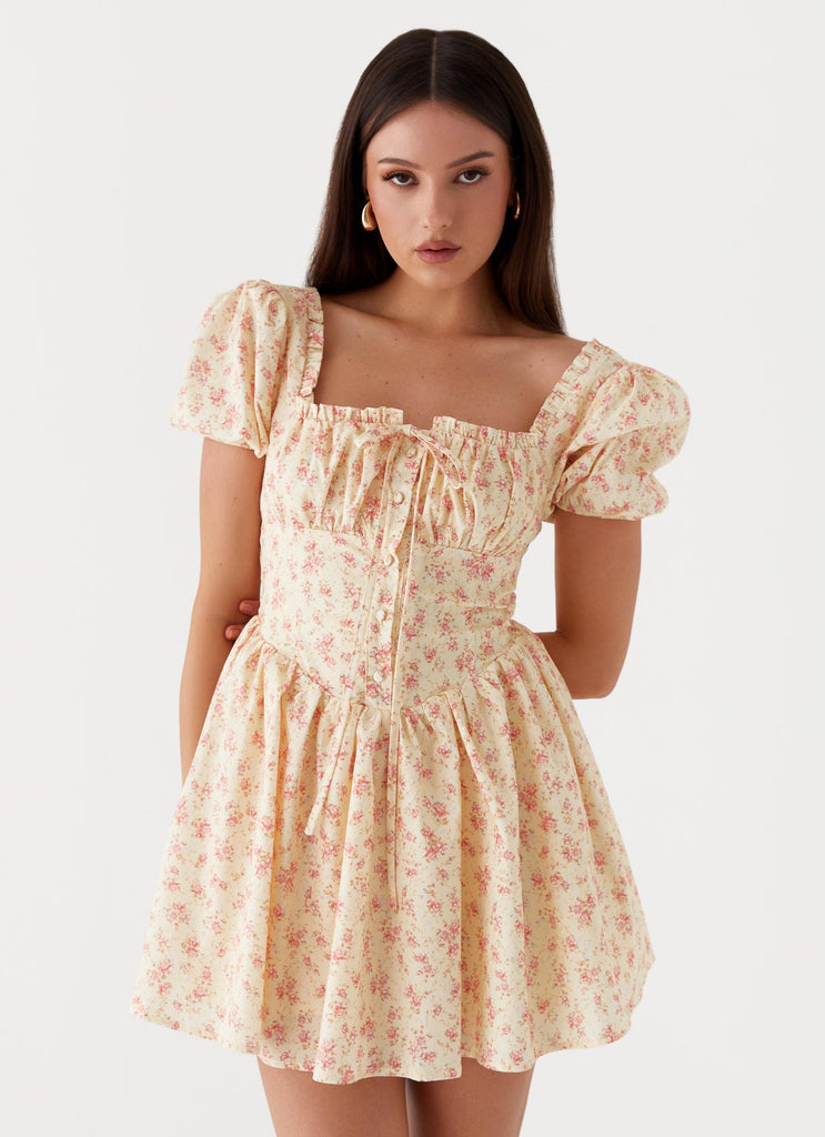 Womens Mila Mini Dress in the colour Yellow Ditsy Floral in front of a light grey background