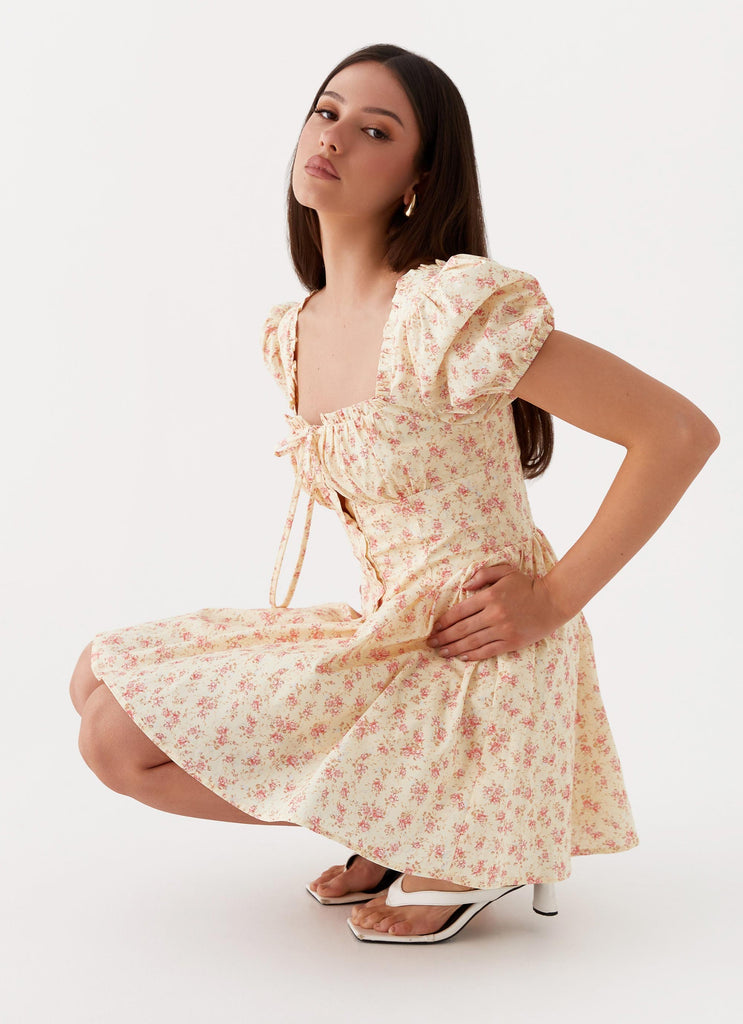 Womens Mila Mini Dress in the colour Yellow Ditsy Floral in front of a light grey background