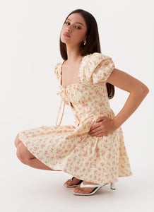 Womens Mila Mini Dress in the colour Yellow Ditsy Floral in front of a light grey background