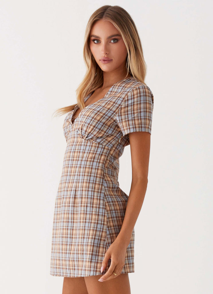 Womens Niki Cap Sleeve Mini Dress in the colour Check in front of a light grey background