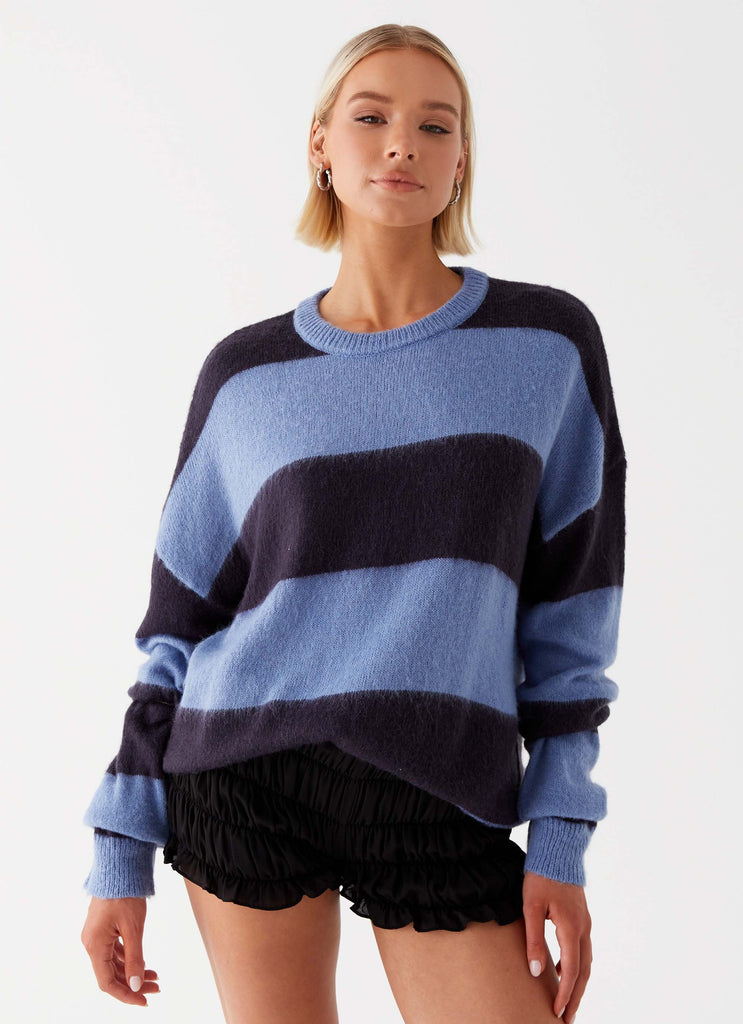 Womens Nikita Fuzzy Knit Sweater in the colour Blue Black Stripe in front of a light grey background