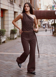 Womens Orla Fitted Flare Pants in the colour Chocolate in front of a light grey background