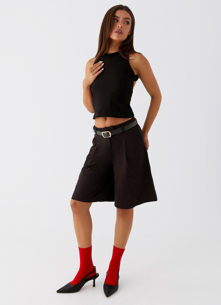 Womens Jeni Long Tailored Jorts in the colour Black in front of a light grey background