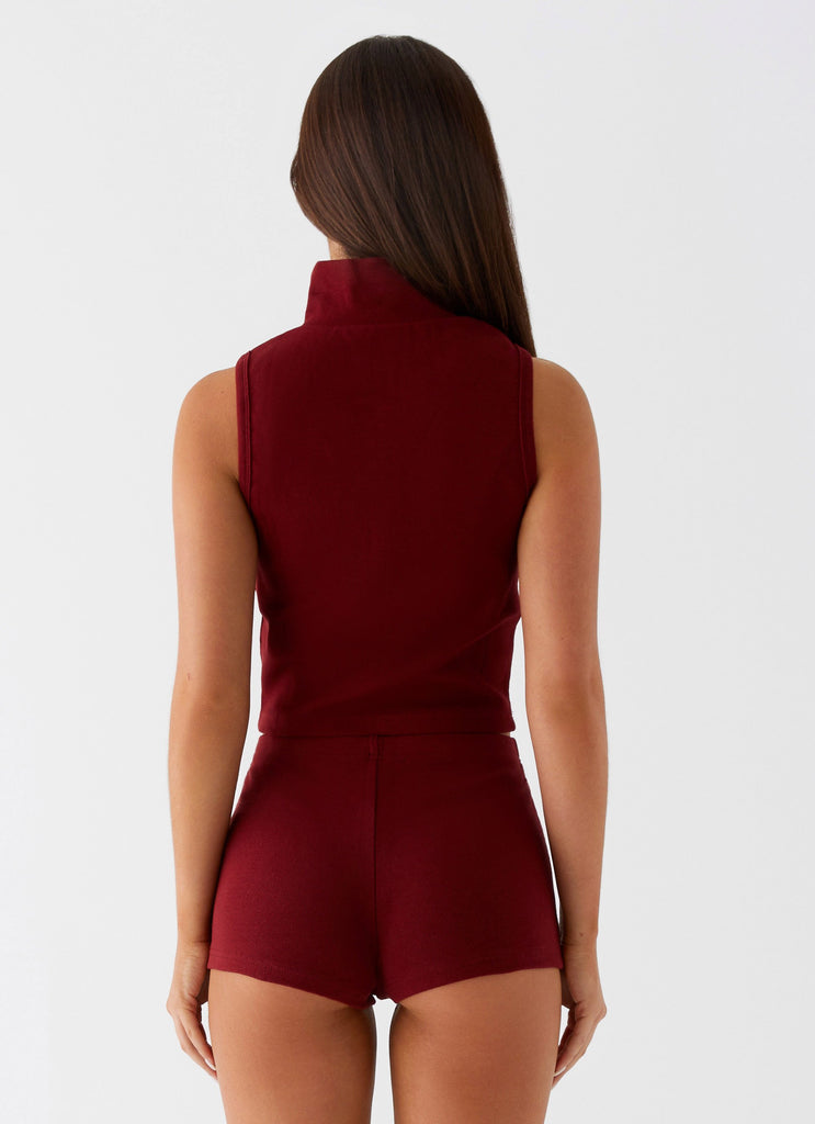 Womens Spectate Collar Top in the colour Maroon in front of a light grey background