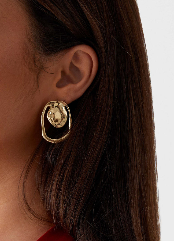 Womens Stone Edge Earrings in the colour Gold in front of a light grey background