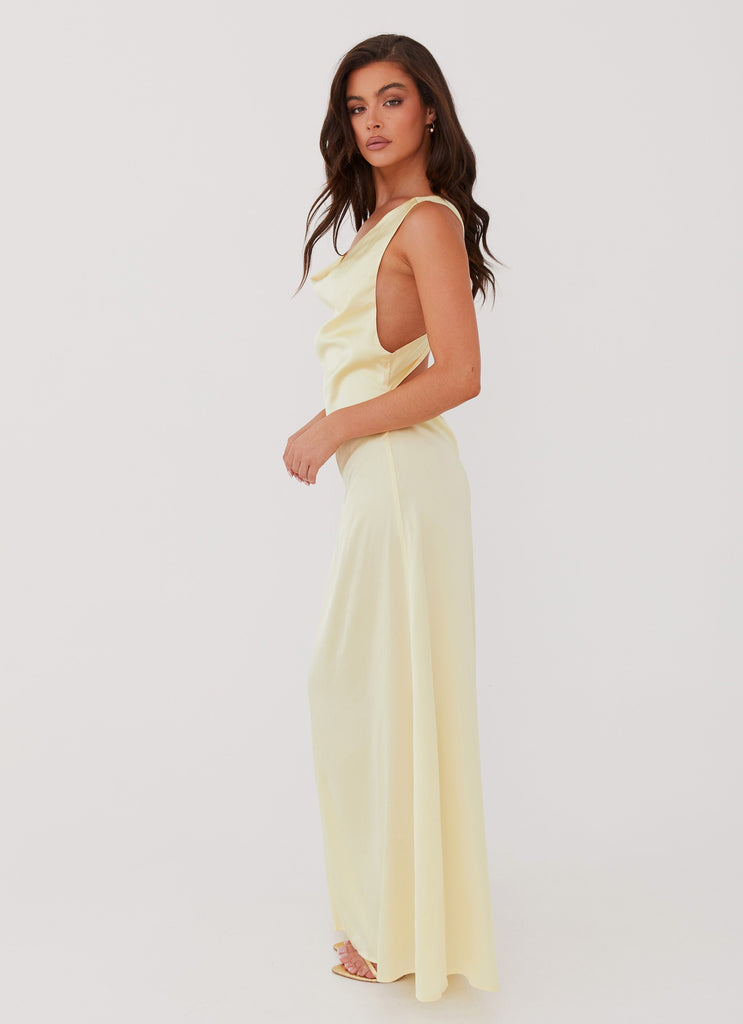 Womens Musa Maxi Dress in the colour Lemon in front of a light grey background