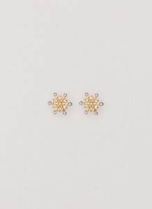 Womens Crystal Snowflake Earring in the colour Gold in front of a light grey background