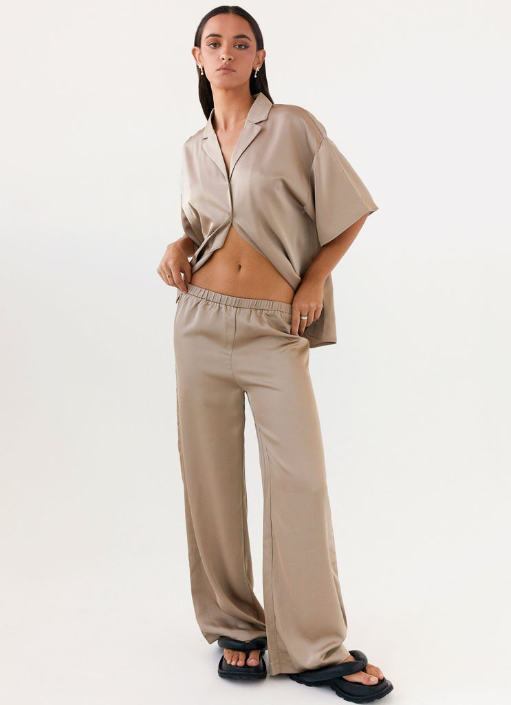 Womens Palm Cove Satin Pants in the colour Mushroom in front of a light grey background