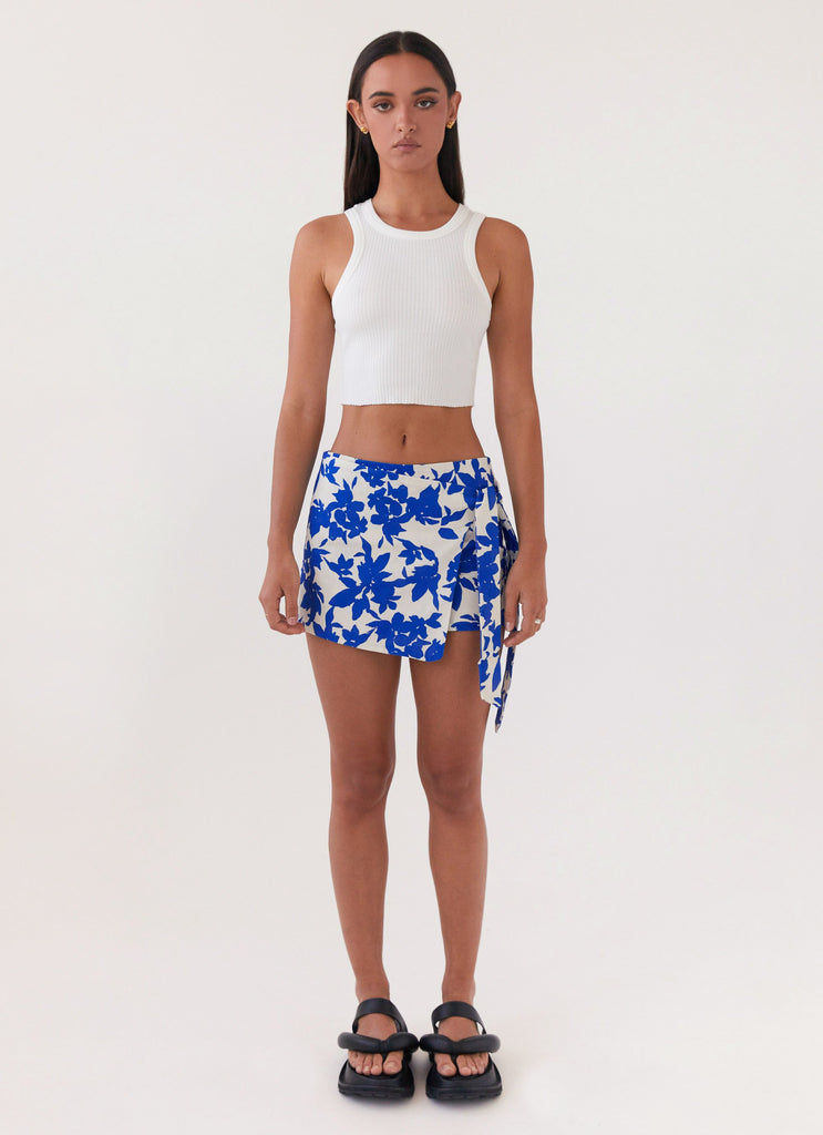 Womens Steal Away Linen Wrap Skirt in the colour Blue Floral in front of a light grey background