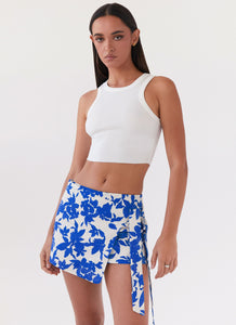 Womens Steal Away Linen Wrap Skirt in the colour Blue Floral in front of a light grey background