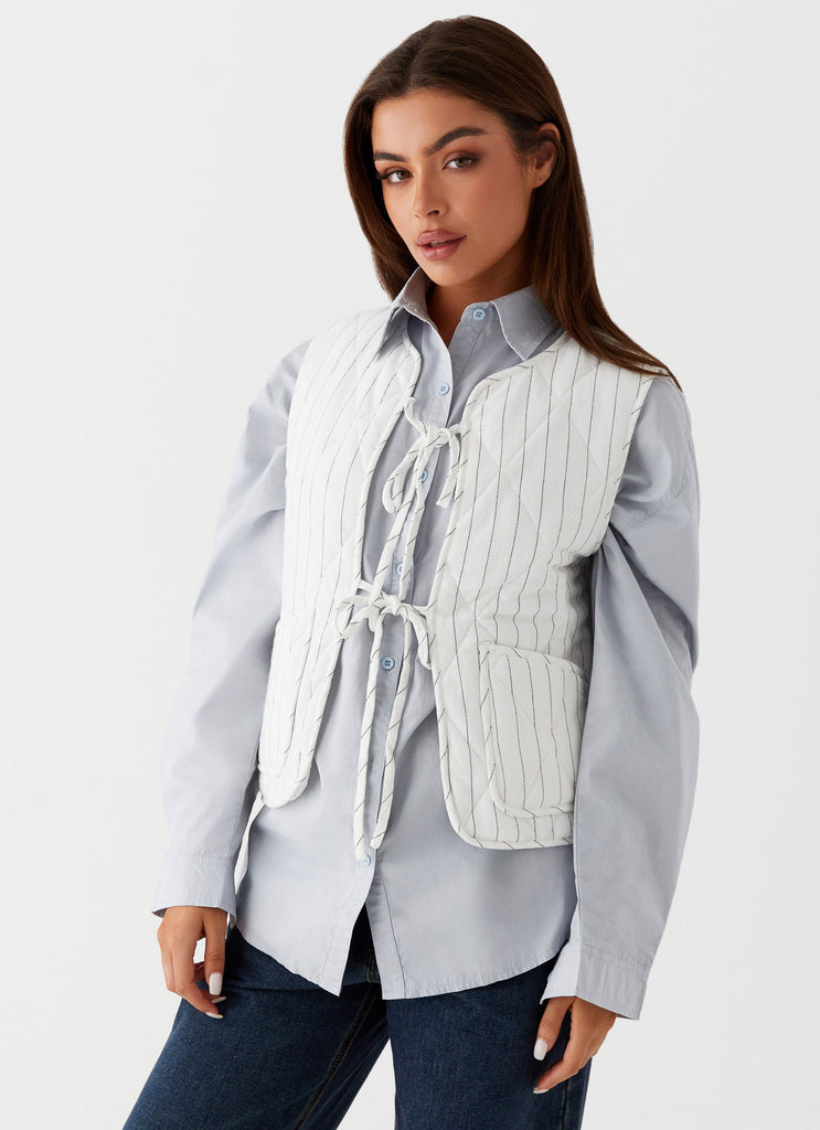 Womens Celini Quilted Vest in the colour White Pinstripe in front of a light grey background