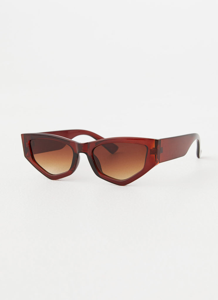 Womens Kyia Sunglasses in the colour Brown in front of a light grey background