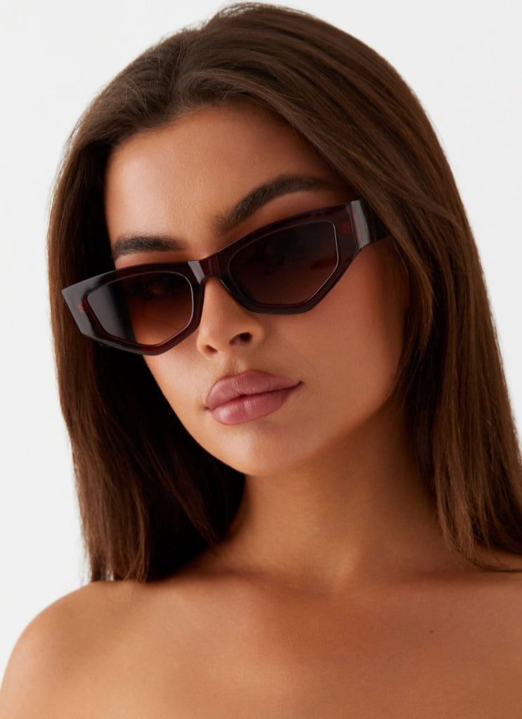 Womens Kyia Sunglasses in the colour Brown in front of a light grey background