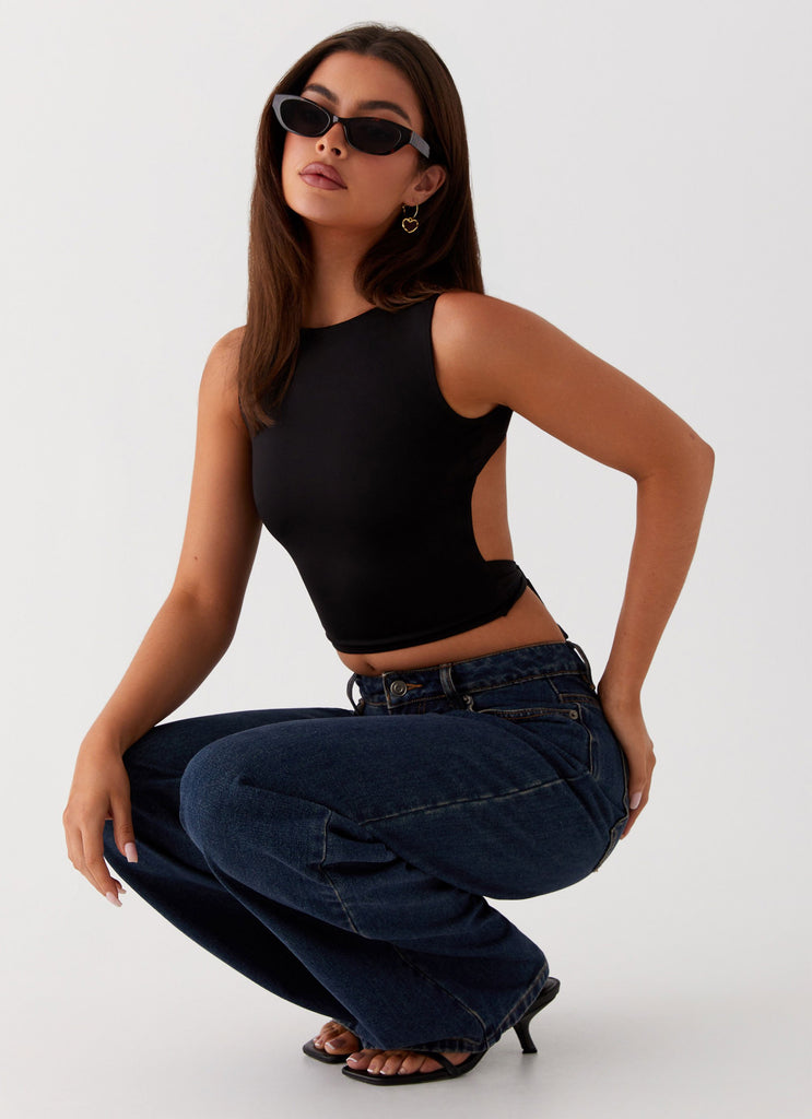 Womens Saskie Crop Top in the colour Black in front of a light grey background