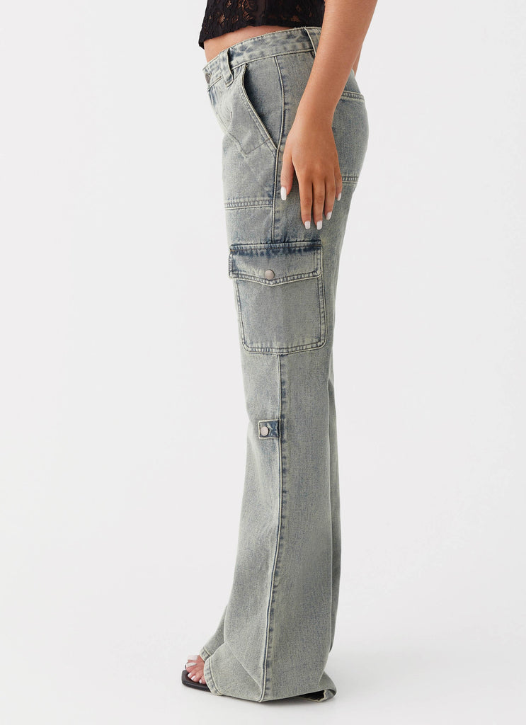 Womens Zephee Flare Jeans in the colour Washed Denim in front of a light grey background