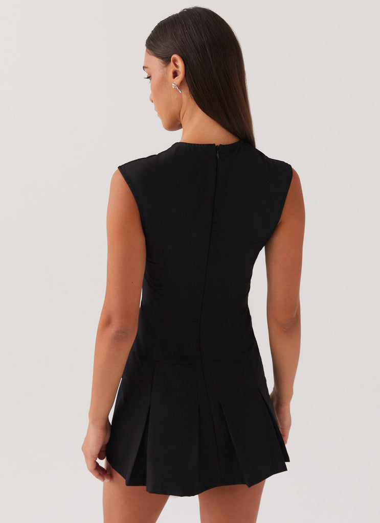 Womens Cassia Mini Dress in the colour Black in front of a light grey background