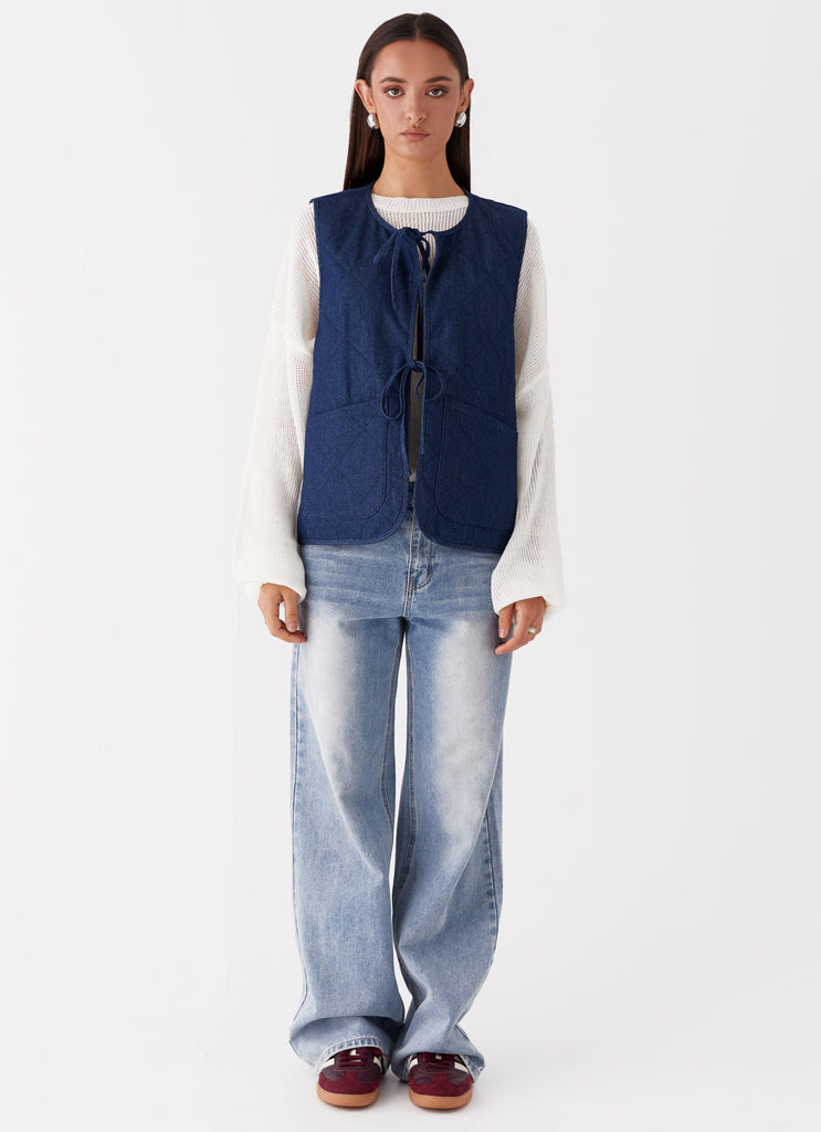 Womens Kennedy Denim Vest in the colour Indigo in front of a light grey background