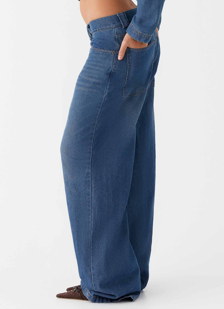 Womens Ride Elegant Baggy Jeans in the colour Vintage Blue Wash in front of a light grey background