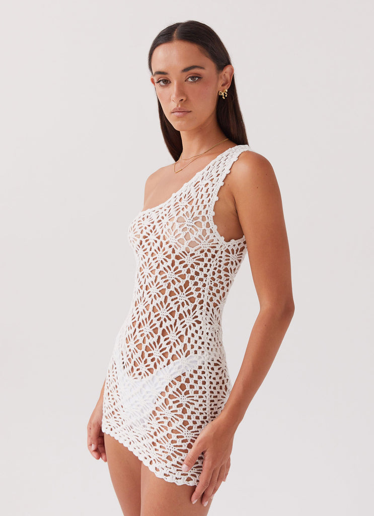 Womens Linera Crochet Mini Dress in the colour White in front of a light grey background