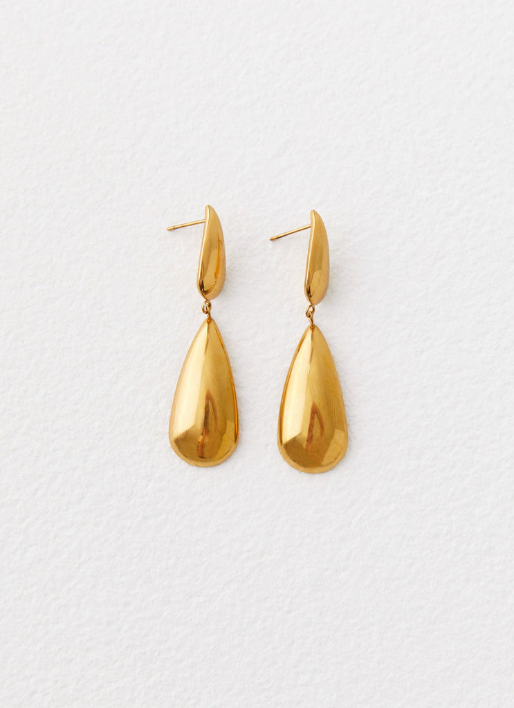 Womens Stay True Earrings in the colour Gold in front of a light grey background