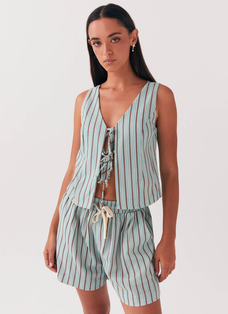 Womens Tina Linen Vest Top in the colour Coastal Stripe in front of a light grey background