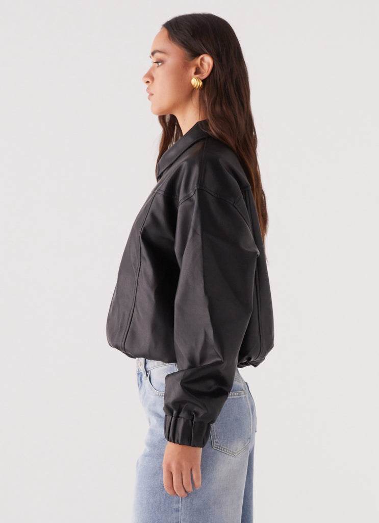 Womens Houghton Oversized Bomber Jacket in the colour Black in front of a light grey background