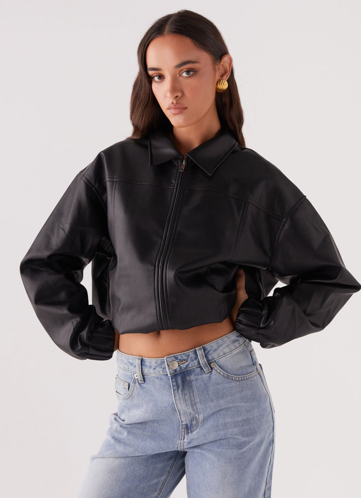 Womens Houghton Oversized Bomber Jacket in the colour Black in front of a light grey background