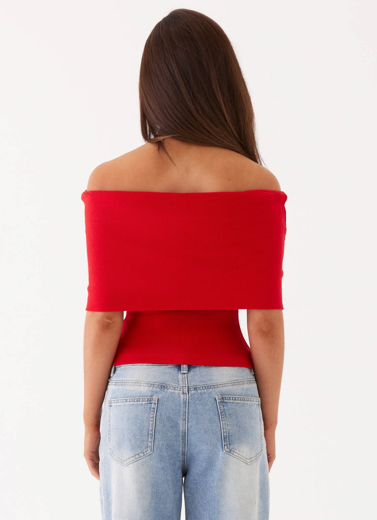 Womens Nellie Knit Top in the colour Cherry in front of a light grey background