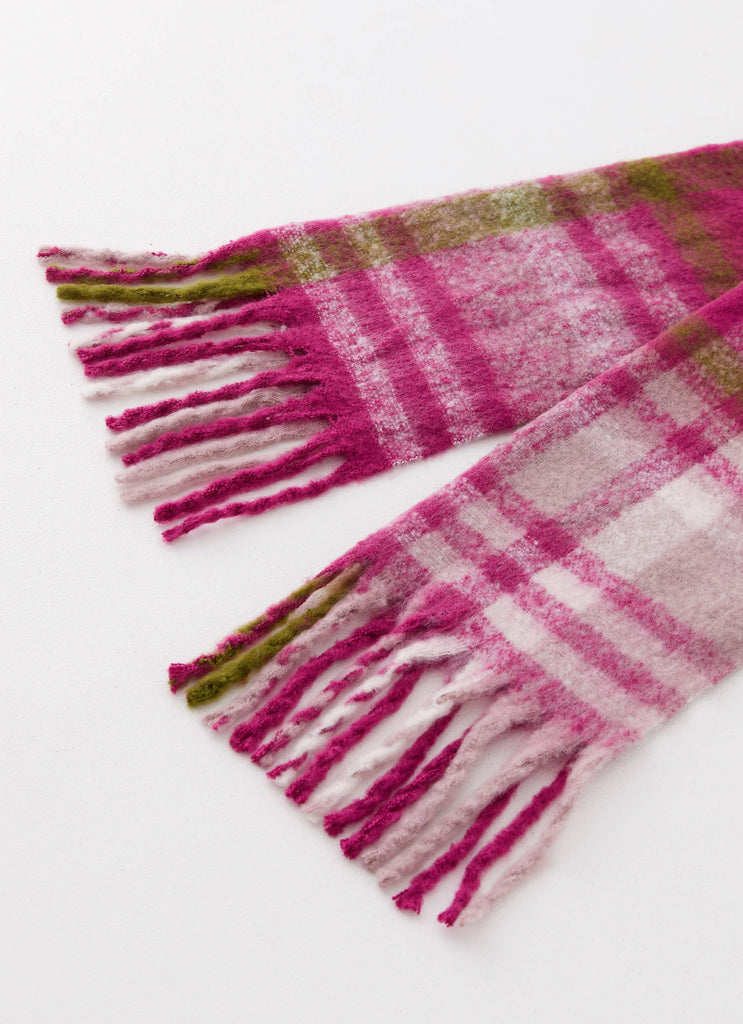 Womens Rainier Plaid Scarf in the colour Pink in front of a light grey background