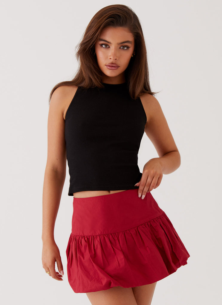 Womens Hotel California Low Rise Mini Skirt in the colour Red in front of a light grey background