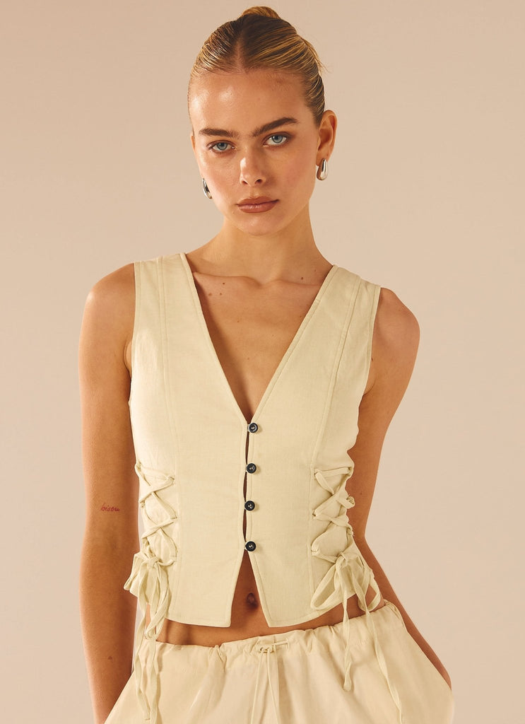 Womens Alessa Tie Side Vest in the colour Cream in front of a light grey background