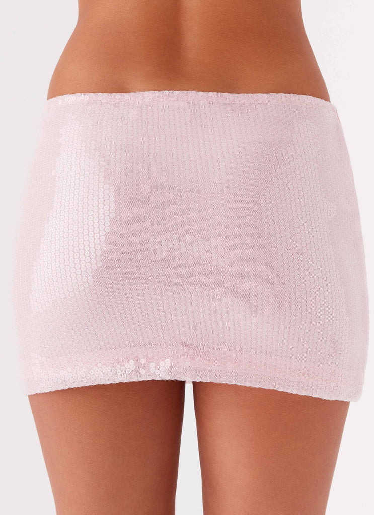 Womens Perfect Fantasy Sequin Mini Skirt in the colour Pink in front of a light grey background