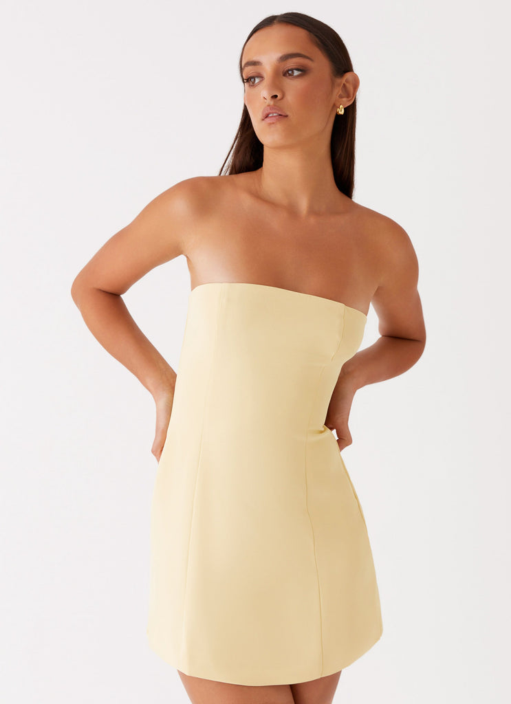 Womens Ayanna Strapless Mini Dress in the colour Yellow in front of a light grey background