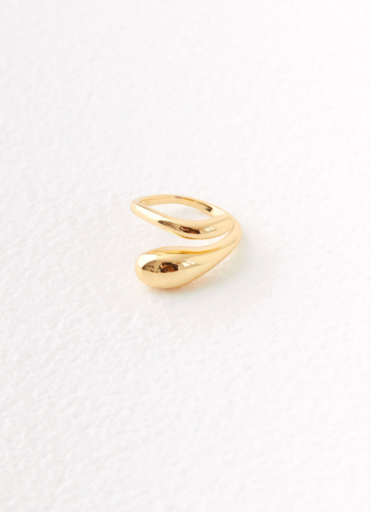 Womens Teardrop Wrap Ring in the colour Gold in front of a light grey background