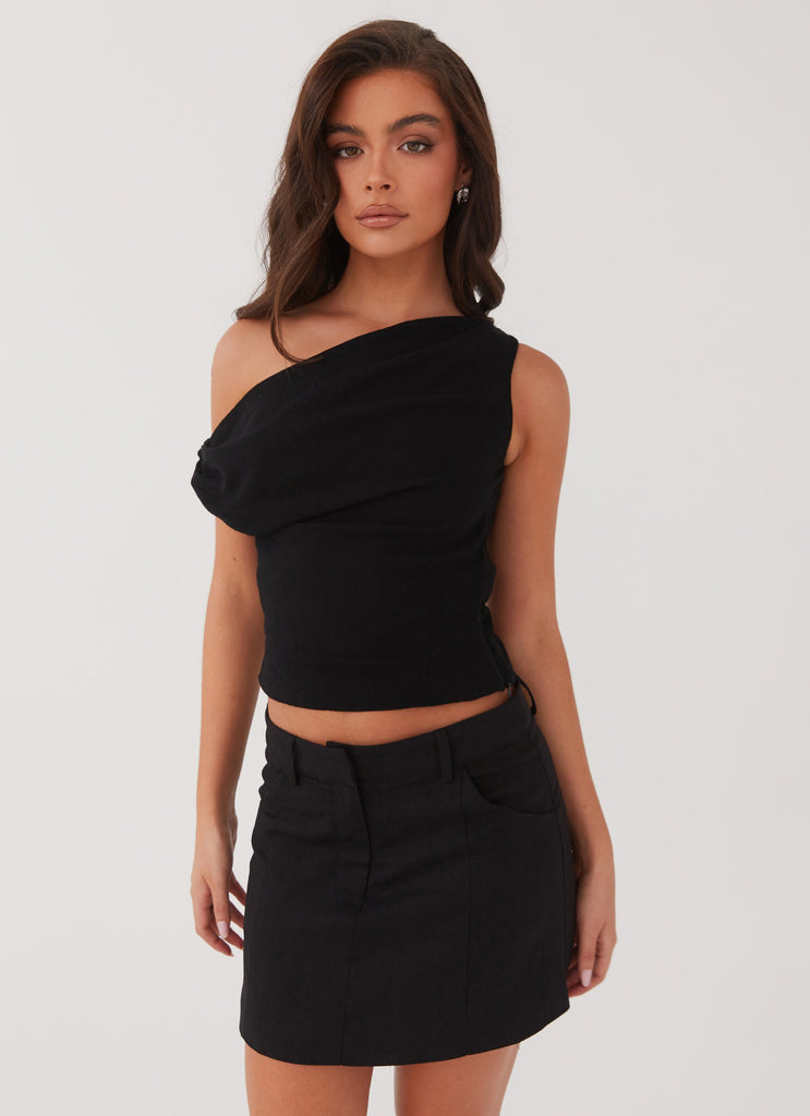 Womens Marissa Linen One Shoulder Top in the colour Black in front of a light grey background