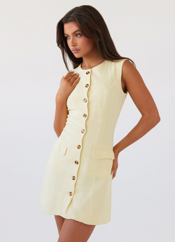 Womens Castello Fiore Linen Mini Dress in the colour Lemon in front of a light grey background