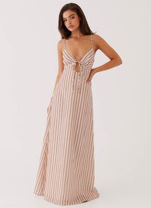 Womens Flora Linen Maxi Dress in the colour Passionfruit Stripe in front of a light grey background