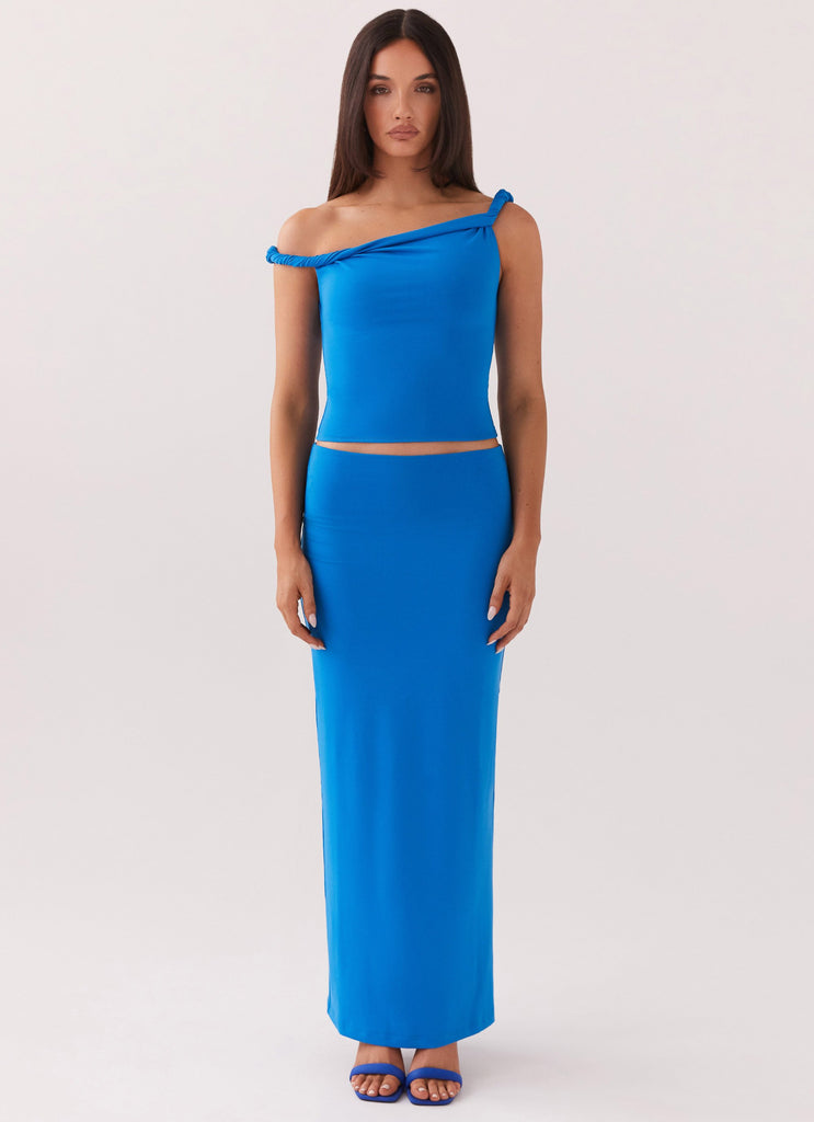 Womens Solace Soul Twist Shoulder Top in the colour Cobalt in front of a light grey background