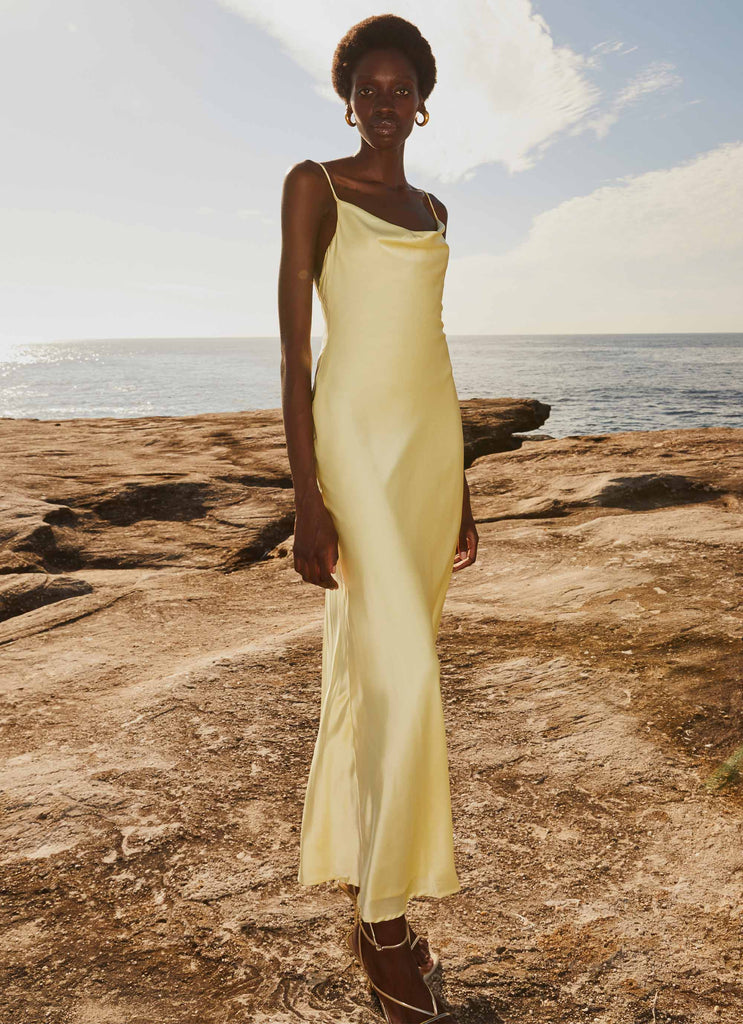 Womens Joanna Satin Maxi Dress in the colour Lemon in front of a light grey background